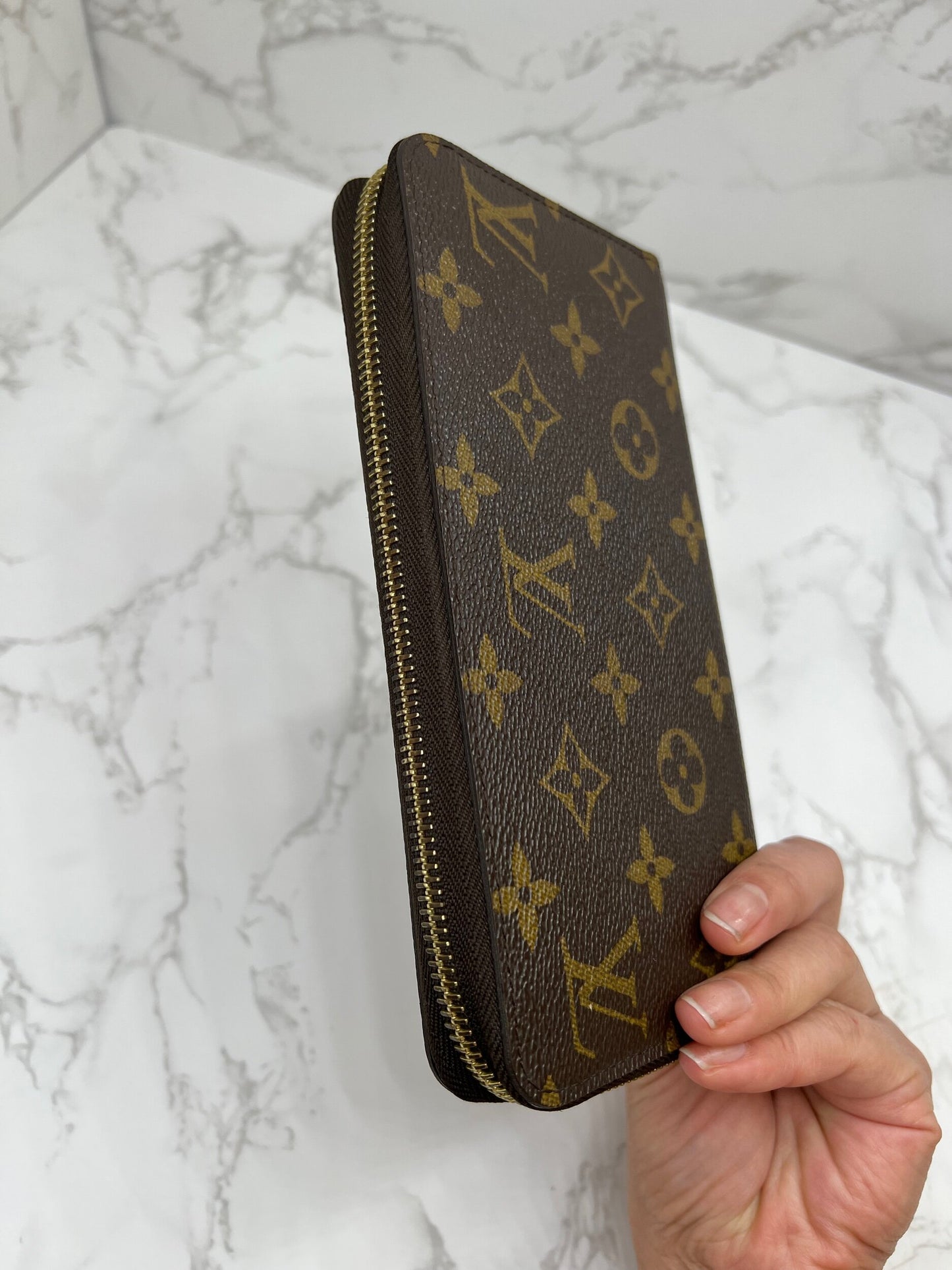 Zippy Wallet Monogram Canvas Brown