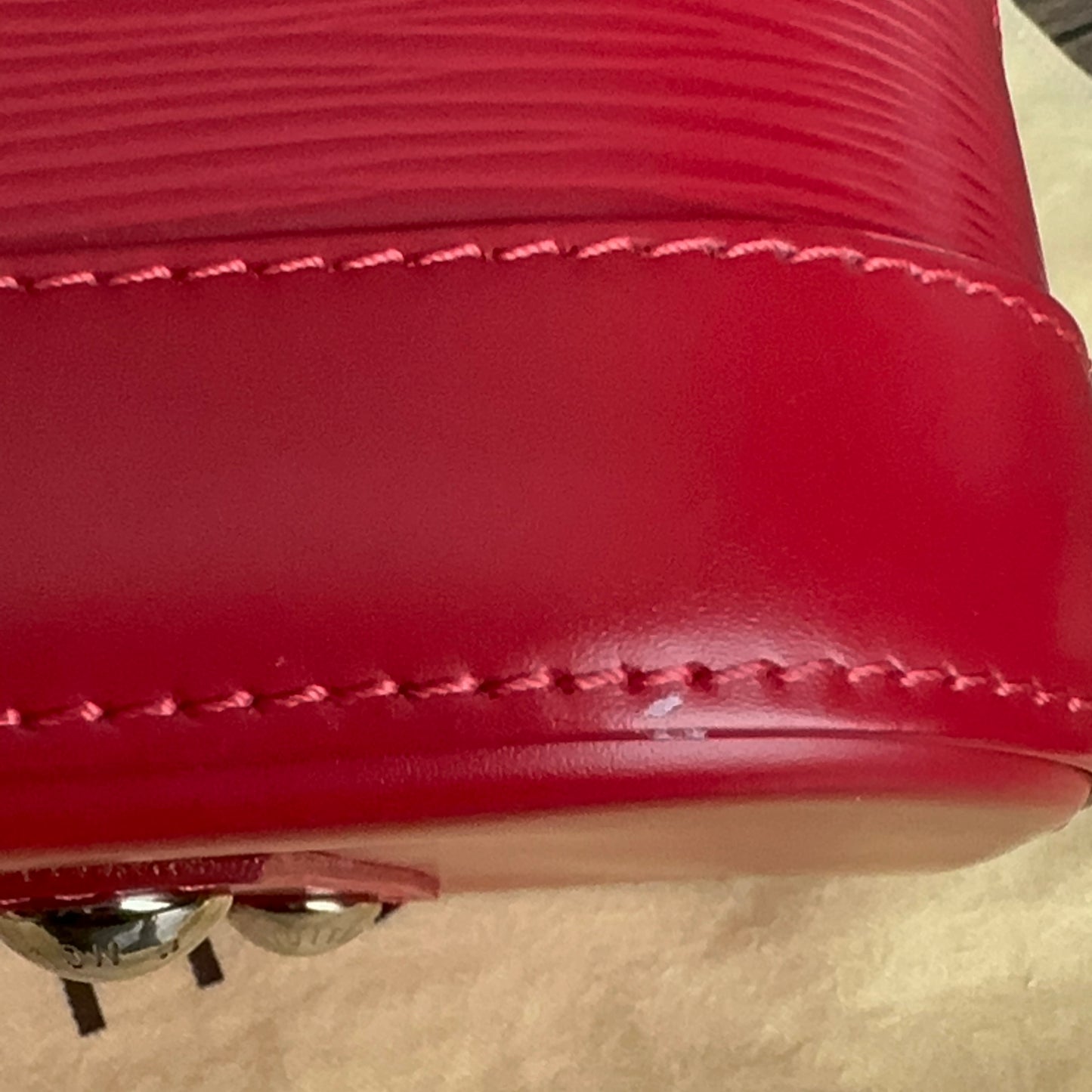 Coquelicot Epi Leather Alma PM