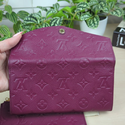 Louis Vuitton Curieuse  Empreinte Leather Wallet Aurore