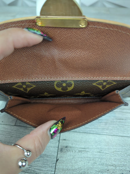 Louis Vuitton Astrid Clutch Wallet