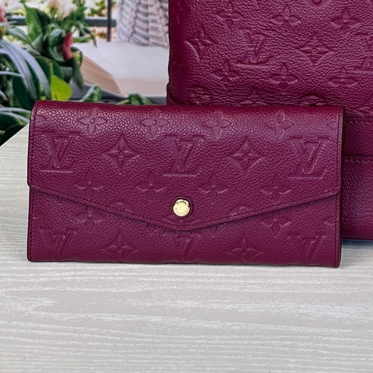 Louis Vuitton Curieuse Wallet Aurore Empreinte Leather