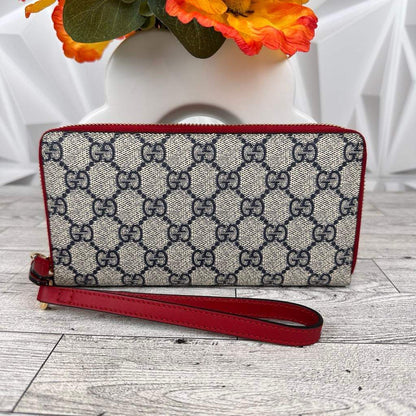 Gucci GG Supreme Monogram Wristlet Wallet Navy Blue/Red