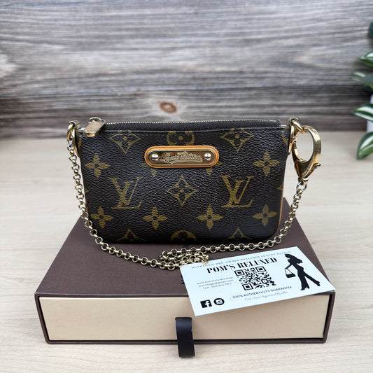 Louis Vuitton Milla PM Clutch