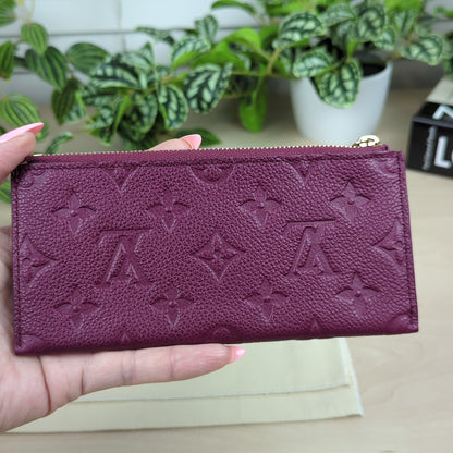 Louis Vuitton Curieuse  Empreinte Leather Wallet Aurore