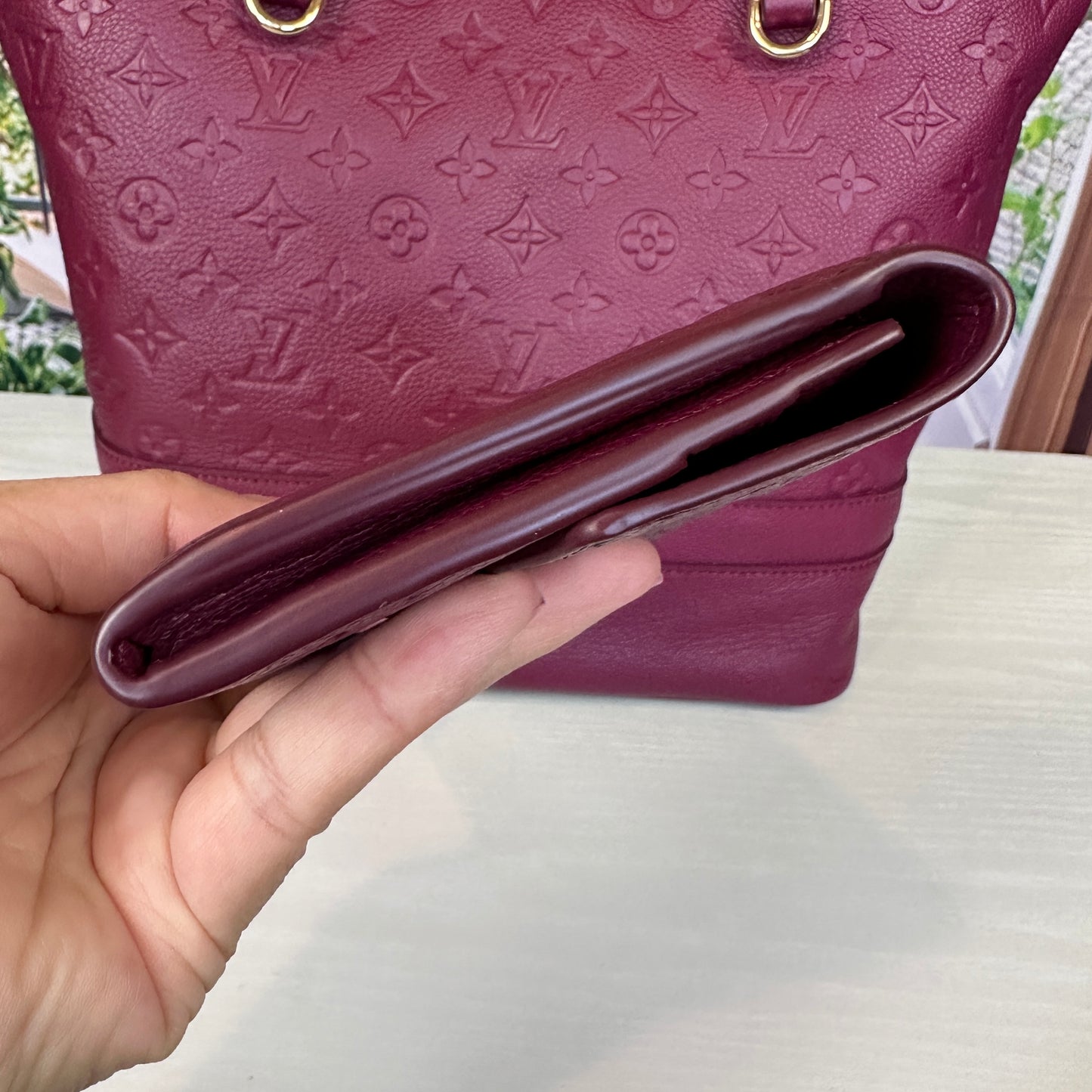 Louis Vuitton Curieuse Wallet Aurore Empreinte Leather